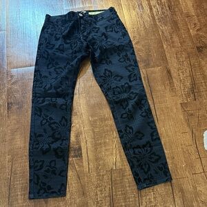 Black flocked pattern straight leg pants.